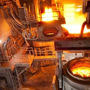 Furnace Laddle Molten metal being poured from furnace