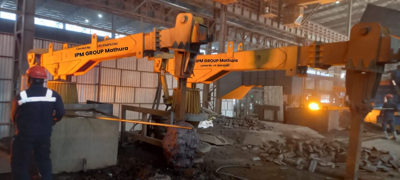 Industrial hydraulic pusher in operation